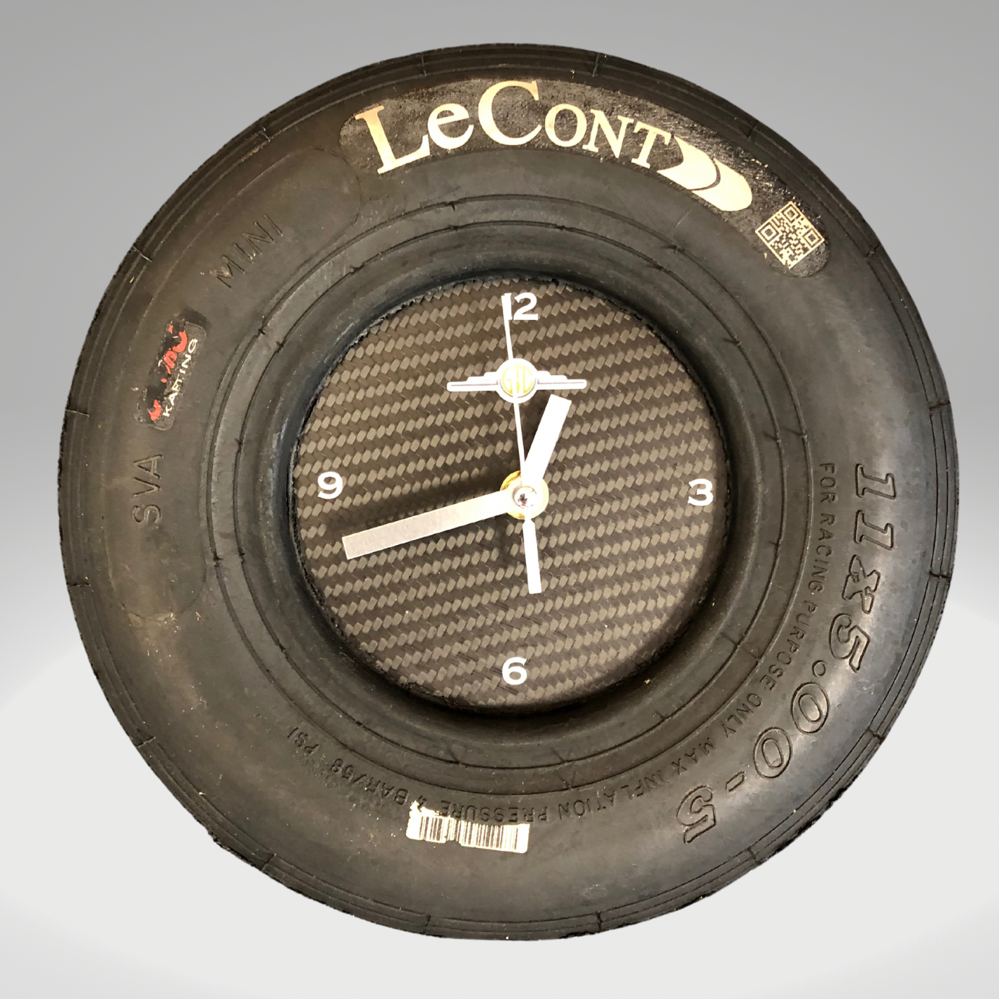 A clock made from a used gokart tire