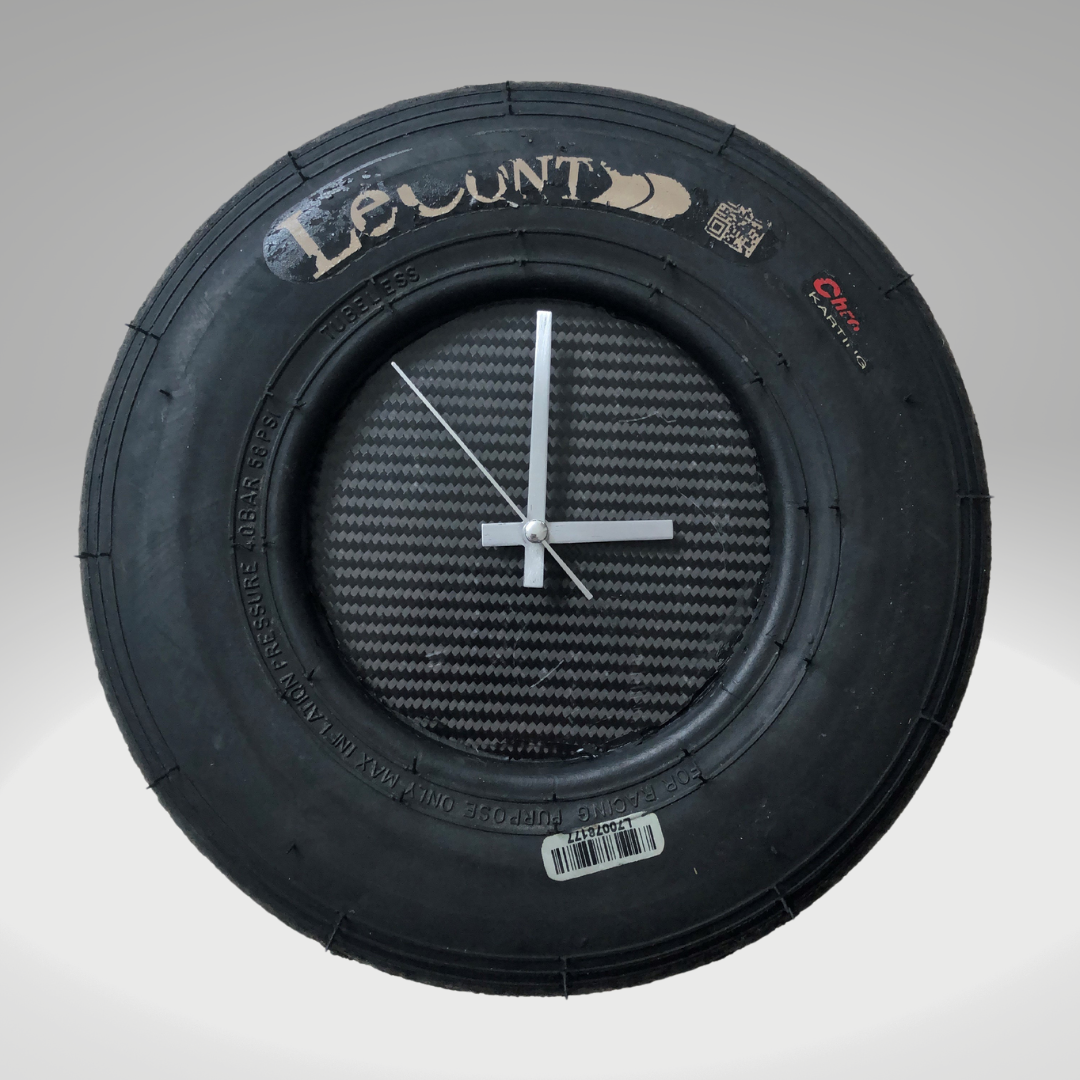 "Race Against Time: Go-Kart Tire Wall Clock"